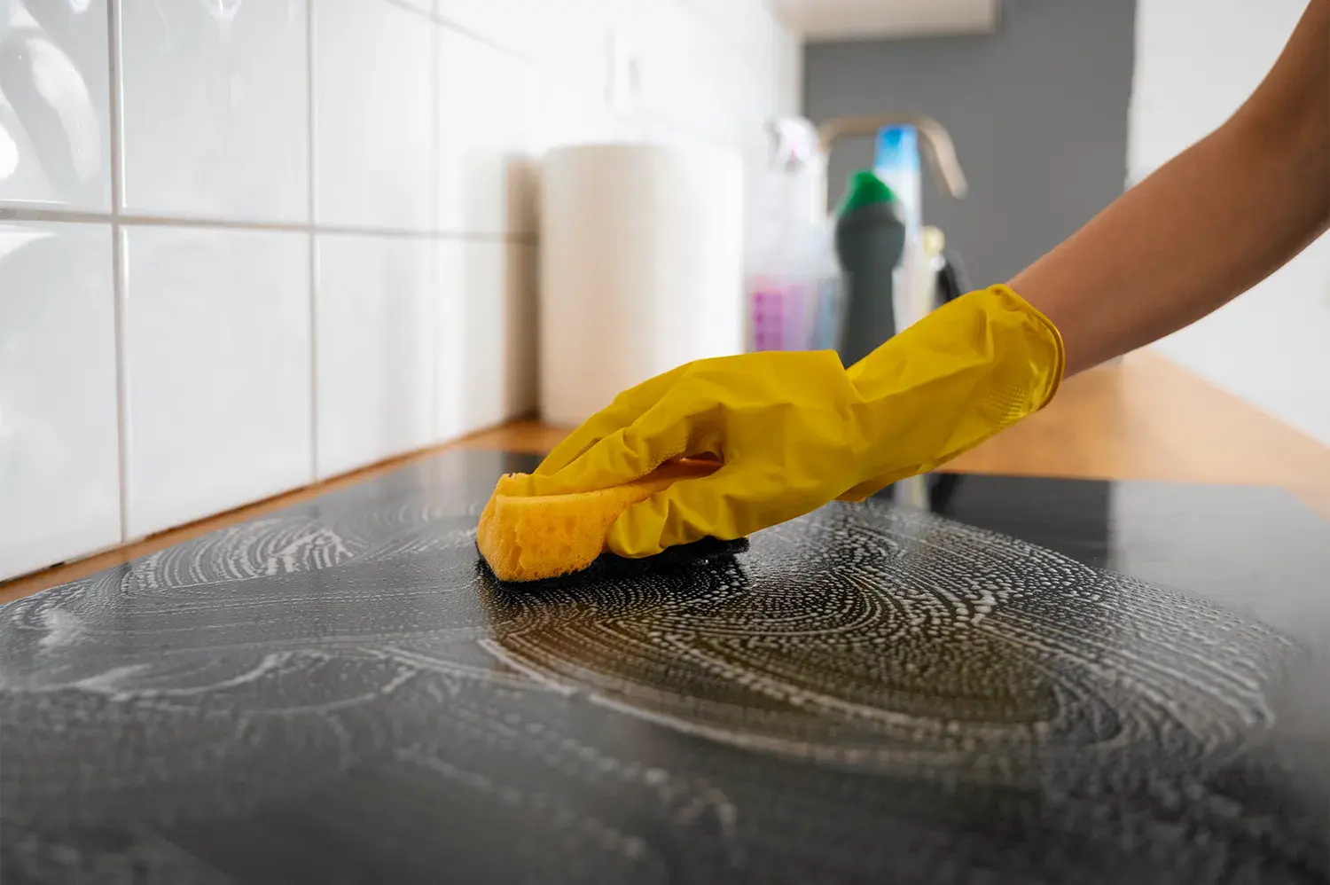 Cleaner working through a home